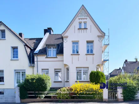 Hausansicht - Haus kaufen in Dortmund / Brackel - Charmante Doppelhaushälfte in Dortmund-Brackel – Ein Zuhause mit Charakter!