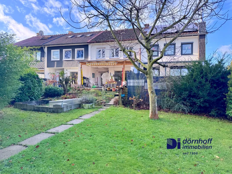 Garten/Hausansicht - Haus kaufen in Dortmund / Brackel - Modernisiertes Zuhause mit Wohlfühlcharakter