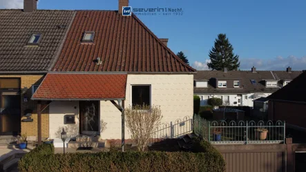 Hausansicht - Haus kaufen in Dortmund - Klein aber fein: Charmantes Reihenendhaus mit Garten und Garage in Dortmund-Westrich