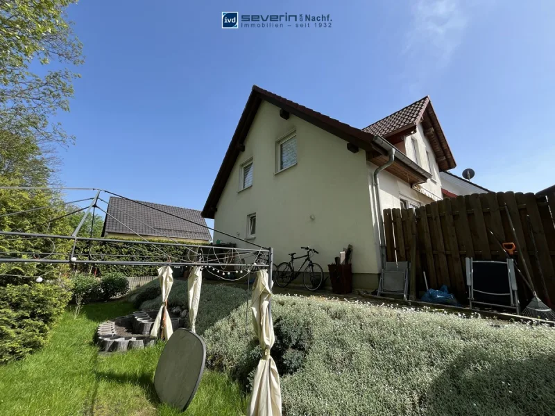 Seitenansicht - Haus kaufen in Bergkamen / Rünthe - Freistehendes Einfamilienhaus wartet auf frischen Wind!