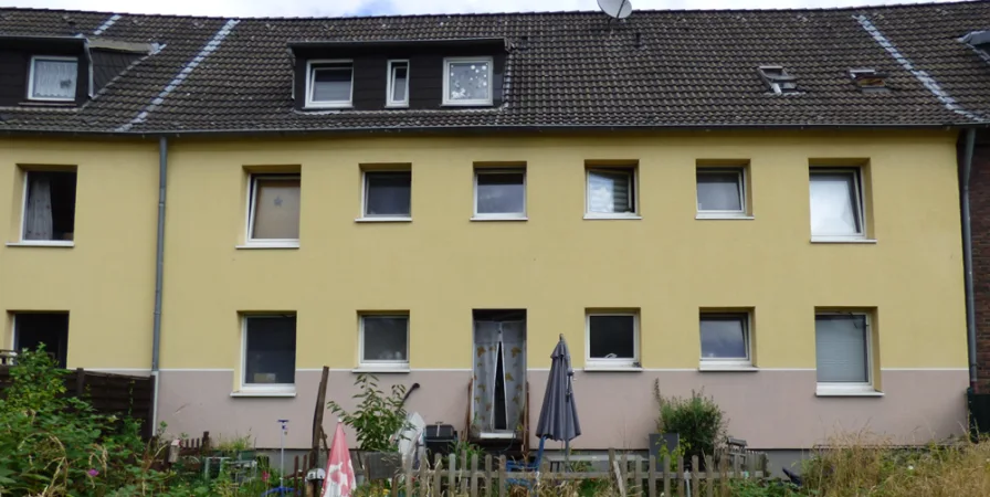 Rückansicht - Haus kaufen in Duisburg - Umfangreich saniertes Mehrfamilienhaus mit fünf Wohneinheiten