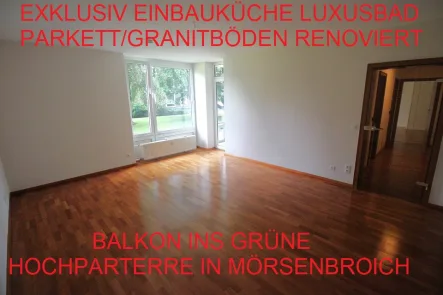 Titelbild - Wohnung mieten in Düsseldorf - EXKLUSIV EINBAUKÜ. PARKETT/GRANITBÖDEN LUXUSBAD BALKON INS GRÜNE RENOVIERT HOCHPARTERRE MÖRSENBROICH