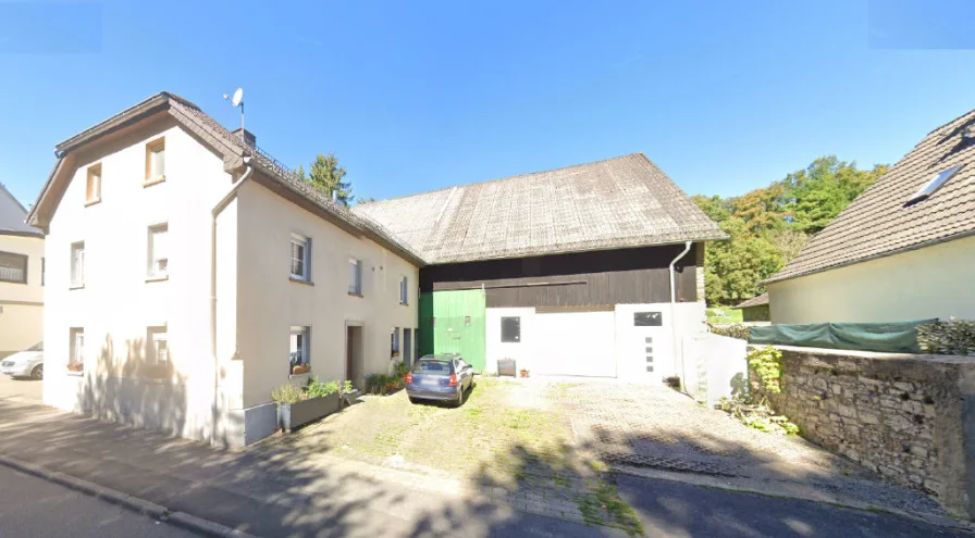 Bild1 - Haus kaufen in Kall-Urft - Einfamilienhaus mit großer Scheune und weiterem Bauland!