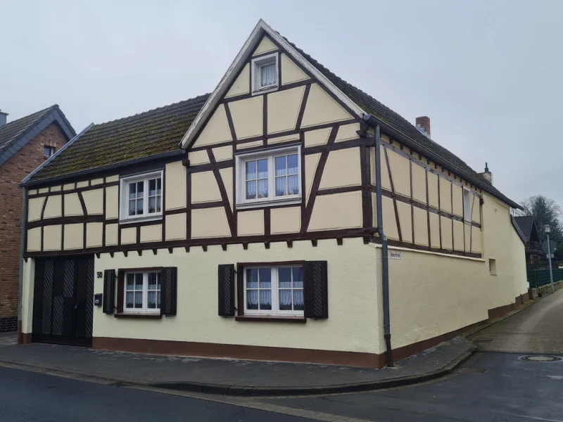 Bild1 - Haus kaufen in Weilerswist-Metternich - Gepflegtes Einfamilienhaus mit Innenhof und Werkstatt!