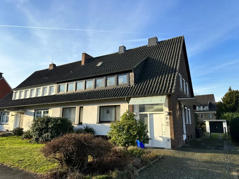 Außenansicht - Haus kaufen in Gladbeck - Charmante Doppelhaushälfte in direkter Nähe zum Gladbecker Nordpark!