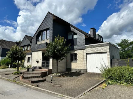 Außenansicht - Haus kaufen in Gladbeck - Schönes Zweifamilienhaus mit besonderem Flair in beliebter und ruhiger Lage von Gladbeck-Rentfort