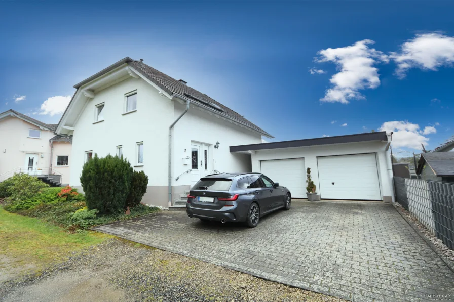 24-DR-60 - Haus kaufen in Sessenhausen - Tolles, solides Einfamilienhaus im gepflegten Zustand mit Doppelgarage!