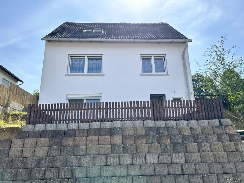 SP-24-CPVH-261 - Haus kaufen in Rockenhausen - Einfamilienhaus mit ausgebautem Keller, großem, sonnigen Grundstück und Carport