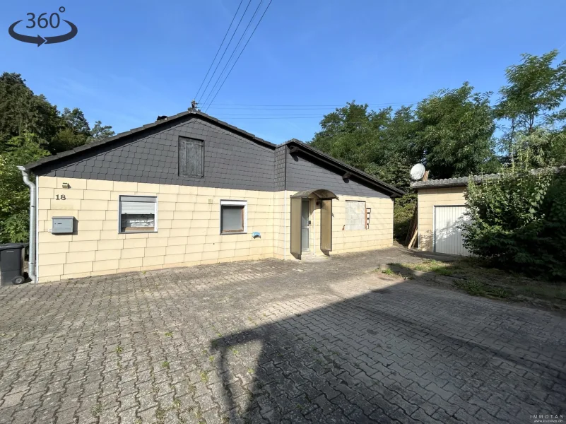 24-DIVH-144  - Haus kaufen in Enkenbach-Alsenborn - Wohnhaus mit großer Garage sowie Geräte-/Lagerraum und ausreichend Gestaltungspotenzial