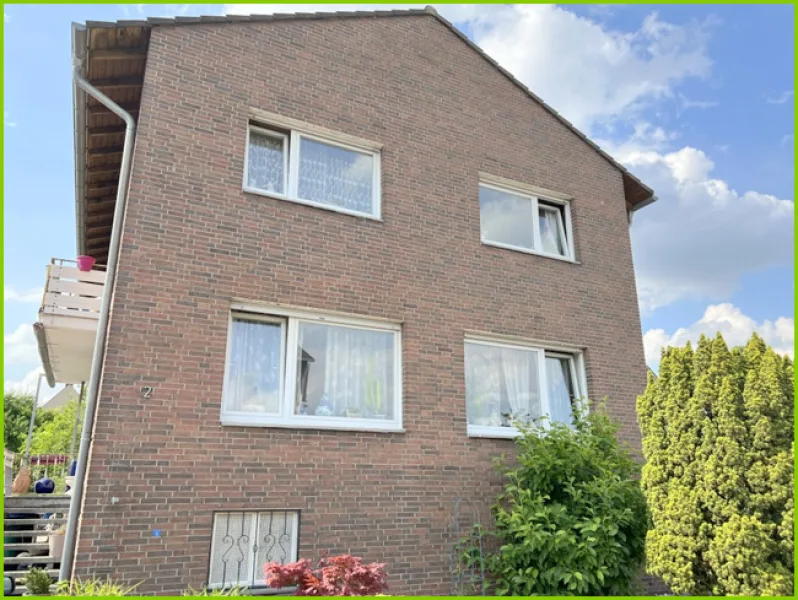 Straßenansicht - Haus kaufen in Hamm - Geräumiges freistehendes Einfamilienhaus in schöner Lage von Hamm-Herringen