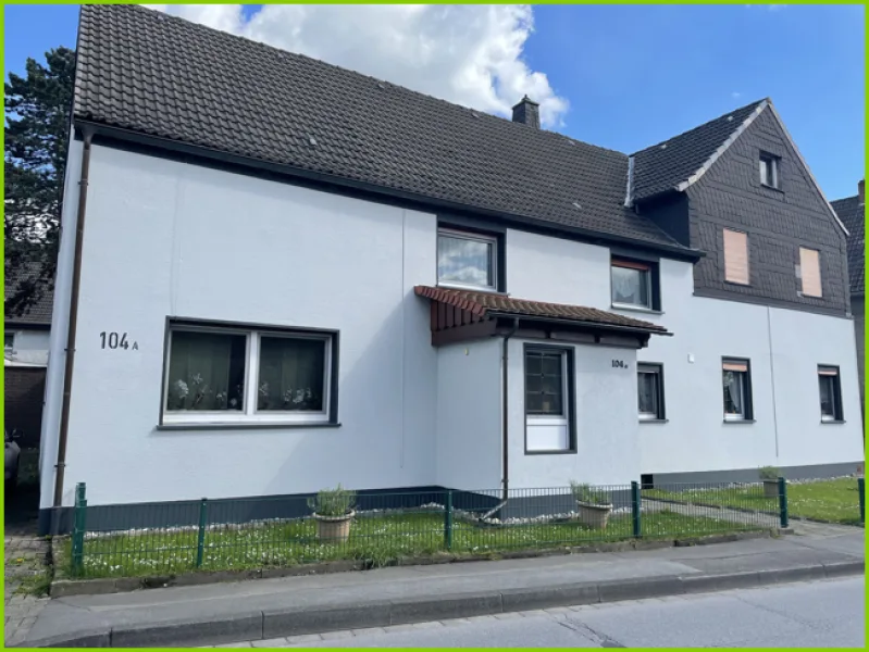 Straßenansicht - Zinshaus/Renditeobjekt kaufen in Unna - Renditestarke Kapitalanlage mit Potential in Unna-Lünern