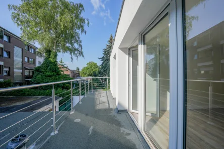 Balkon - Wohnung kaufen in Düsseldorf - Platz für die große Familie - Am Rather Wald
