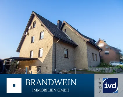 11113 Maskenbild 2 - Haus kaufen in Herford - Ein- bis Zweifamilienhaus am Stiftberg mit Blick über die Dächer von Herford.