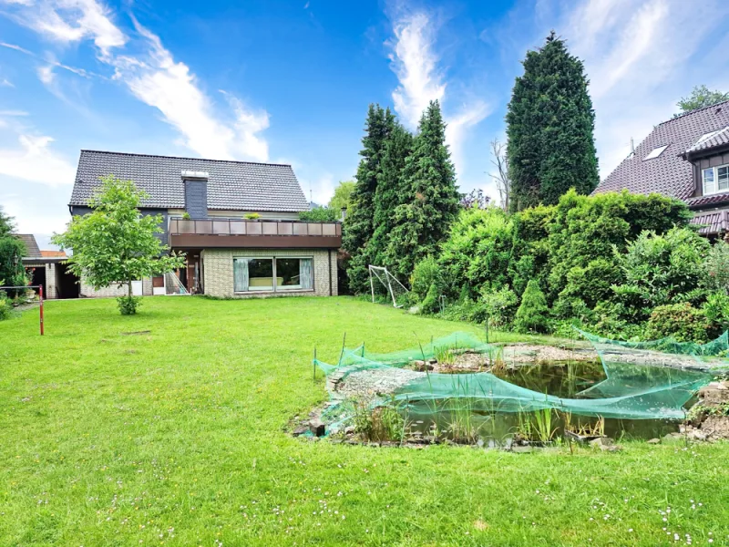 Garten - Haus kaufen in Gladbeck - Charmantes Wohnhaus mit 2 getrennten Wohnungen und großer Dachterrasse inkl. Weitblick