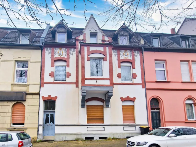 Straßenansicht - Haus kaufen in Herne - Charmantes 3-Familienhaus in der City – EG bezugsfrei mit Garten