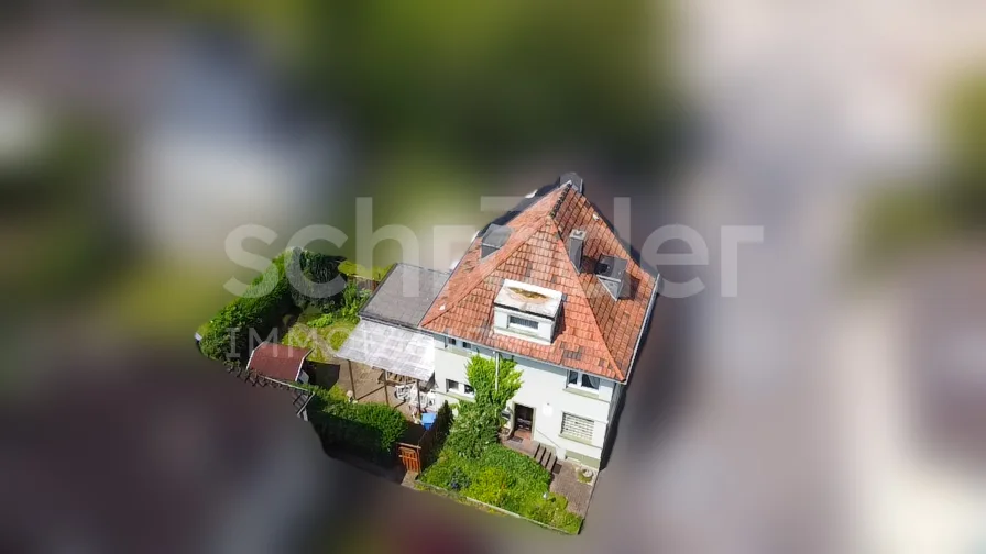 Gesamtansicht - Haus kaufen in Jülich - Doppelhaushälfte mit Garten zwischen Rur und Innenstadt