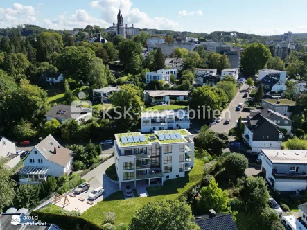 Rückansicht - Wohnung kaufen in Bergisch Gladbach - Letzte Einheit - Traumwohnung mit Garten in Toplage!