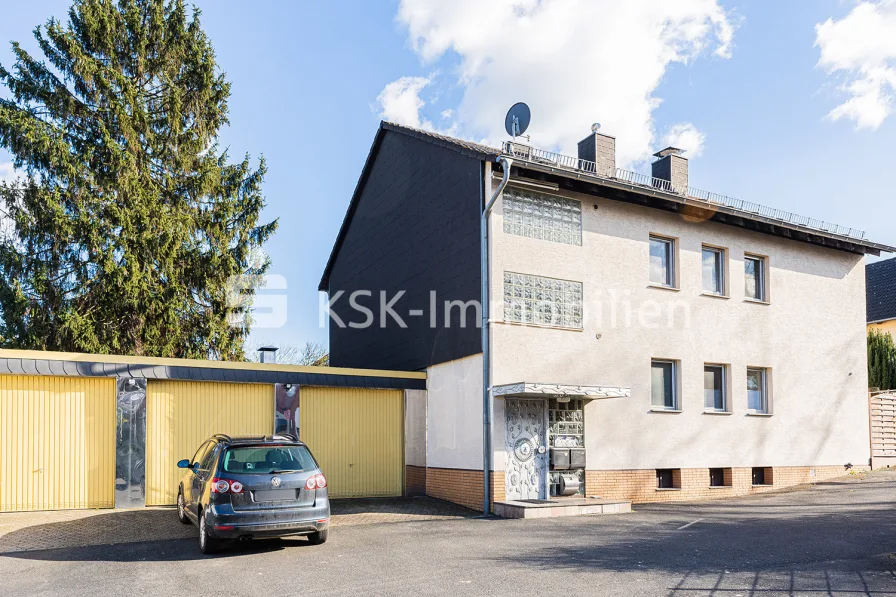 112864 Ansicht - Haus kaufen in Brühl - Solide vermietetes Zweifamilienhaus mit Garage in ruhiger Lage.