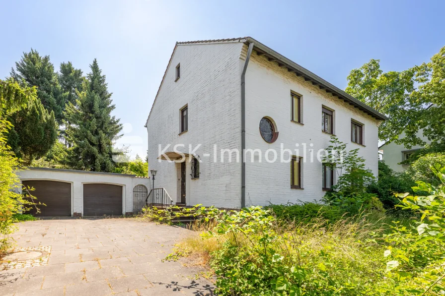 109214 Vorderansicht - Haus kaufen in Hürth - Großes Zweifamilienhaus mit Sanierungsbedarf.