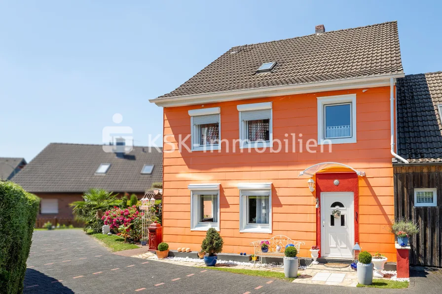 109595 Außenansicht - Haus kaufen in Burscheid - Farbenfrohes Wohnen in Burscheid Kotten!