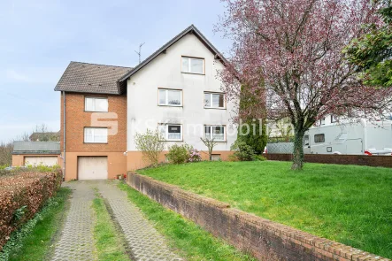 127974 Vorderansicht - Haus kaufen in Kürten - Kürten Bechen - ein Haus, viele Möglichkeiten.