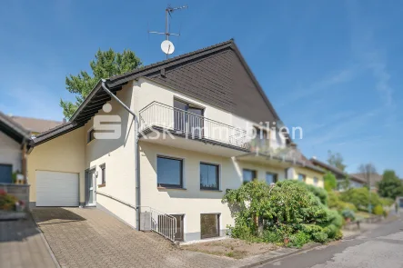 132919 Frontansicht - Haus kaufen in Kürten - Gepflegte Doppelhaushälfte in Kürten Biesfeld.