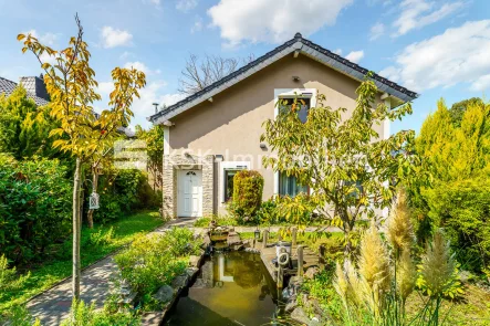 137768 Außenansicht - Haus kaufen in Bonn - Freistehendes Einfamilienhaus in Bonn-Plittersdorf Moderne Ausstattung und viel Raum zum Wohlfühlen.