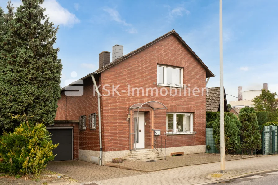 141550 Vorderansicht - Haus kaufen in Bergheim Niederaußem - Saniertes Einfamilienhaus mit schönem Garten.