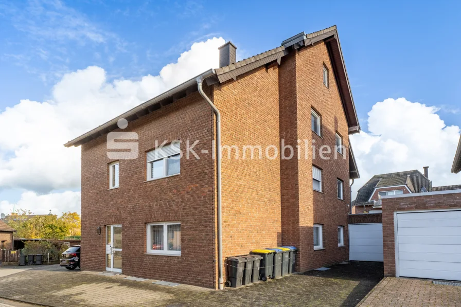 141940 Vorderansicht - Wohnung kaufen in Bergheim - Gepflegte Erdgeschosswohnung mit Garten im Herzen von Bergheim!