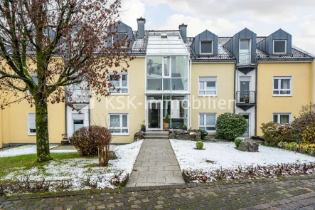 140489 Außenansicht - Wohnung kaufen in Reichshof / Eckenhagen - Vermietete Eigentumswohnung mit Tiefgaragenstellplatz!