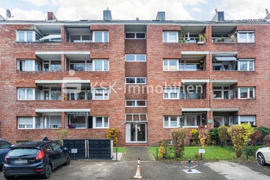 143414 Außenansicht  - Wohnung kaufen in Köln - Helle Maisonettewohnung mit Balkon, großzügigem Raumangebot und viel Stauraum in ruhiger Lage!