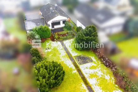 118635 Drohnenansicht - Haus kaufen in Niederkassel - Baugrundstück inklusive vorhandenen Bungalow in Top-Lage!