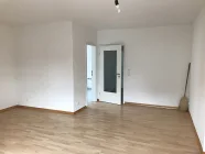 1.OG rechts, Wohnzimmer mit Balkon