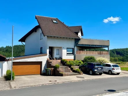 Ansicht - Haus kaufen in Heiligenroth - Heiligenroth, 3-Familienhaus mit Garage *VIRTUELLE 360° BESICHTIGUNG AUF ANFRAGE*