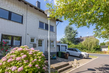 3321 Seitenansicht - Haus kaufen in Hennef / Heisterschoß - Reihenendhaus in naturnaher Lage