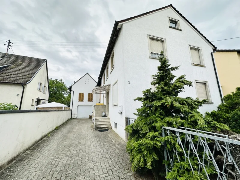 Ansicht - Haus kaufen in Hanhofen - Handwerker aufgepasst! - Großzügiges 2-Familienhaus mit Garage