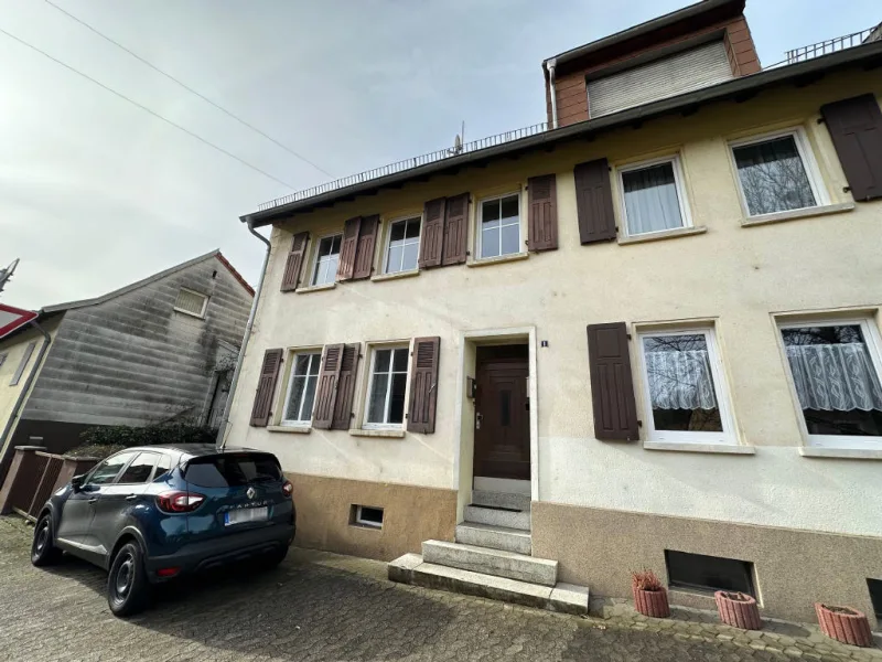 Bild1 - Wohnung kaufen in Saarbrücken - Eigentumswohung im Stil einer Doppelhaushälfte in Saarbrücken-Fechingen