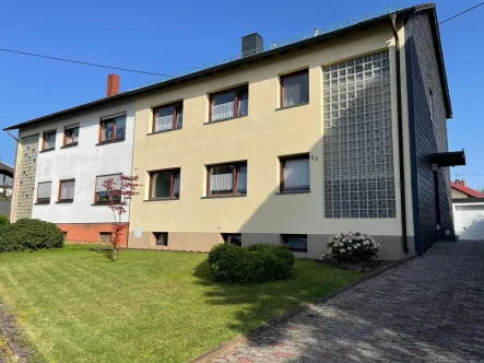 Bild1 - Haus kaufen in Heusweiler - Einseitig angebautes Zweifamilienhaus in Heusweiler-Wahlschied