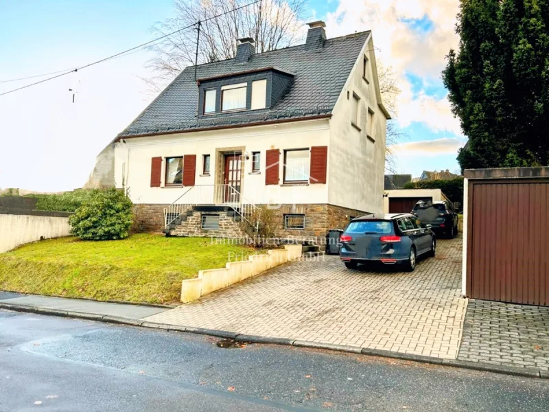 IMG-20240129-WA0006 Kopie ~4 - Haus kaufen in Siegen - Einfamilienhaus mit Garten und Garagen in gesuchter und beliebter Lage
