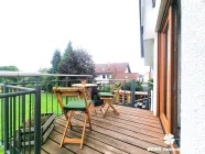 Balkon (Ostausrichtung) mit Wendeltreppe in den Garten