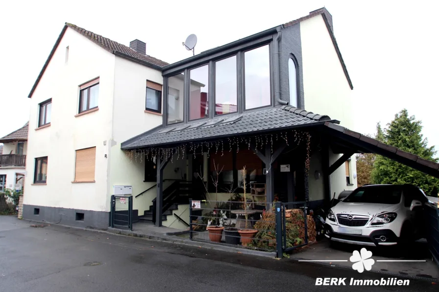 Titelbild - Haus kaufen in Mömbris - BERK Immobilien - großzügiges Einfamilienhaus mit vielen Möglichkeiten im Ortskern von Mömbris