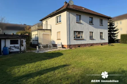 Aussenansicht - Haus kaufen in Miltenberg - BERK Immobilien - Gemütliches Zweifamilienhaus mit idyllischem Garten und herrlichem Fernblick in Miltenberg