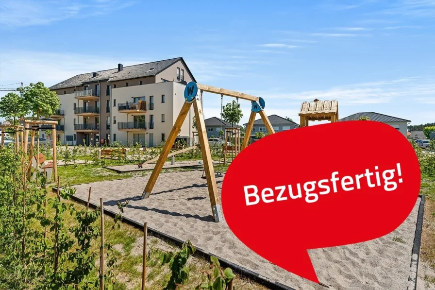 Gebäude & Spielplatz - Wohnung kaufen in Bestensee - Wunderschöne 4-Zimmer-Erdgeschosswohnung zwischen Seen gelegen!