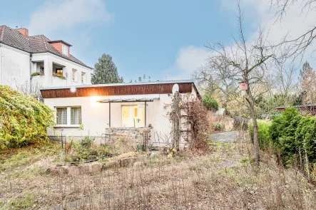 Nebengelass mit Garage - Grundstück kaufen in Berlin - Grundstück mit Einfamilienhaus nahe dem Altglienicker Wasserturm