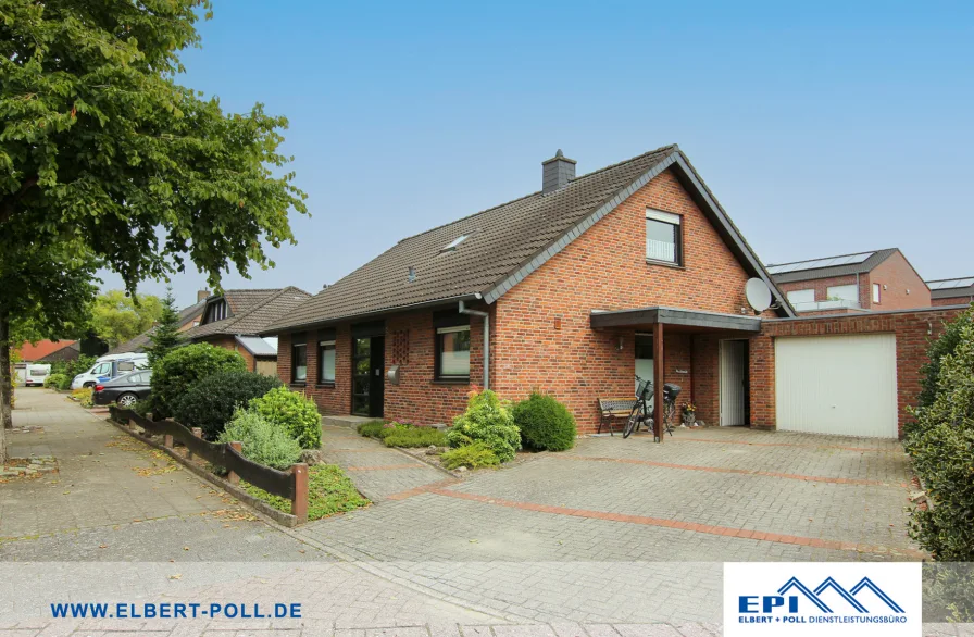 Straßenansicht - Haus kaufen in Nordhorn - Charmantes Einfamilienhaus in ruhiger Wohngegend