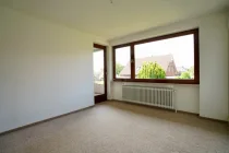 Schlafzimmer mit Zugang zum Balkon