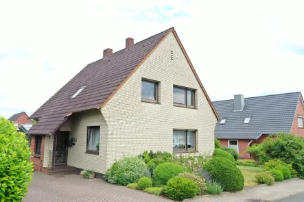 Wohnhaus mit 2 Wohneinheiten - Haus kaufen in Sittensen - Gepflegtes Einfamilienhaus mit Einliegerwohnung im Zentrum von Sittensen