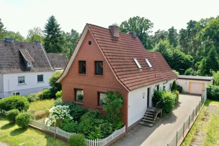 Hausansicht - Haus kaufen in Scheeßel - Einfamilienhaus mit großzügigem Garten in ruhiger Lage