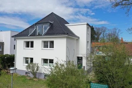 Hausansicht - Wohnung mieten in Rotenburg (Wümme) - Traumhafte, moderne Dachgeschosswohnung in ruhiger Lage