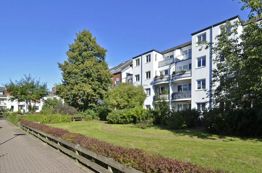 W1081_Titelbild - Wohnung kaufen in Bremen / Woltmershausen - Fest vermietete Hochparterre-Wohnung mit Balkon als solide Anlage